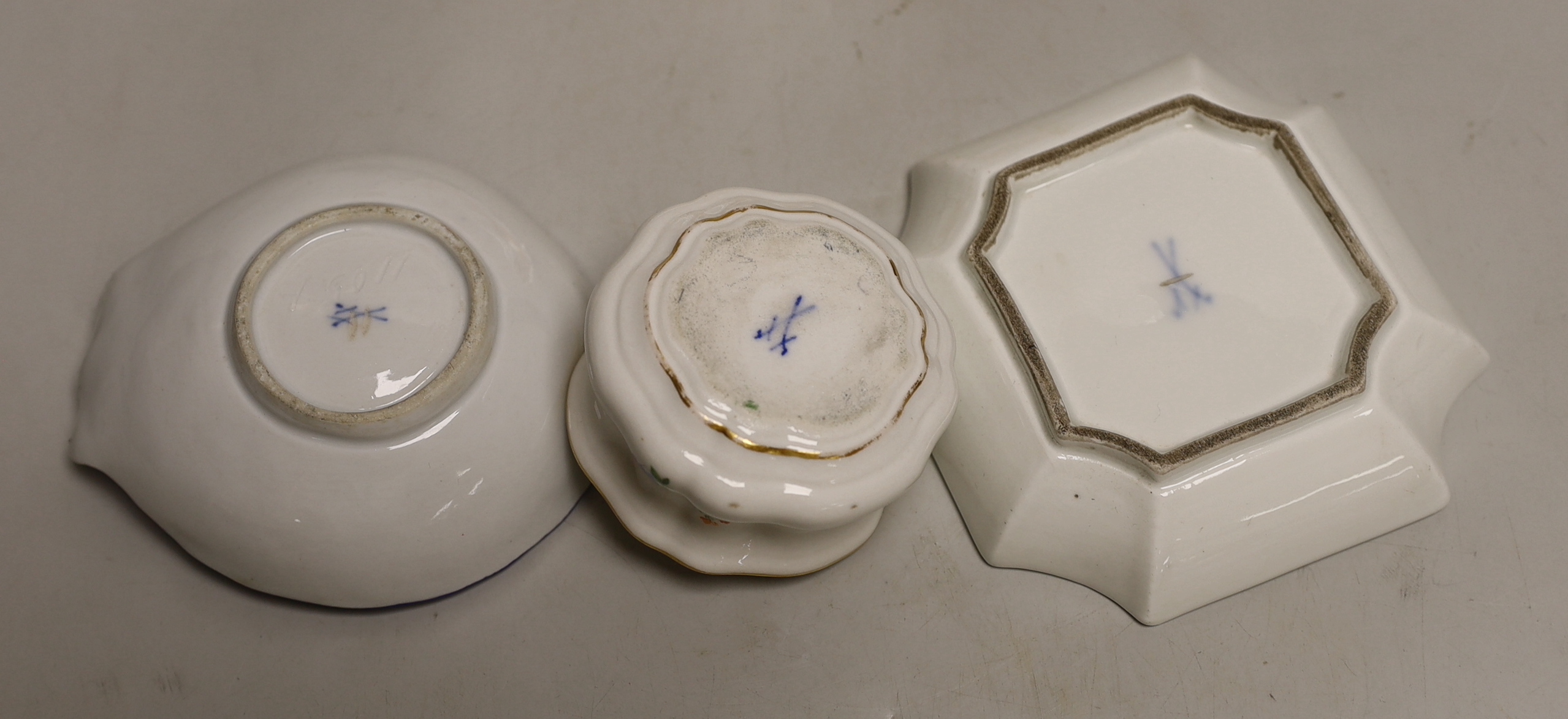 Four Meissen porcelain items including a plate, two small outside decorated dishes and a miniature lidded pot, plate 18cm
